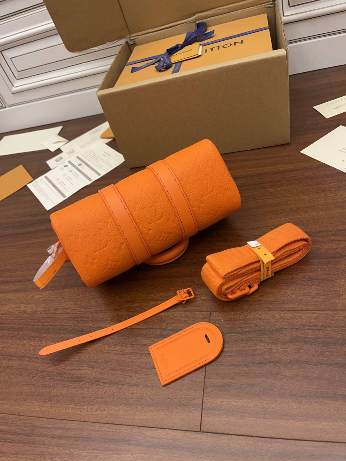 Ellebag’s Expert Replication: Louis Vuitton KEEPALL BANDOULIÈRE 25 Handbag (M20930) Orange-Best Quality Fake Louis Vuitton Bag Online Store, Replica designer bag ru