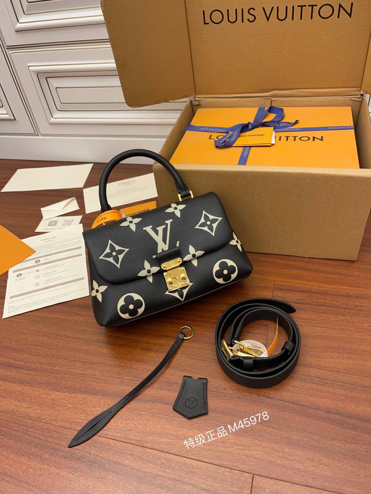 Ellebag Factory’s Replication Techniques for Louis Vuitton M45978 Black Print Madeleine BB Handbag-Duka la Mtandaoni la Begi Bandia ya Louis Vuitton ya Ubora, Begi la wabuni wa Replica ru