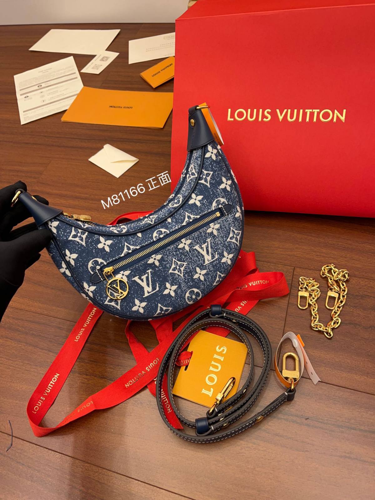 Ellebag Factory’s Expert Replication of Louis Vuitton M81166 LOOP Handbag – A Blend of Denim and Luxury-Best Quality Replica designer Bag factory in China