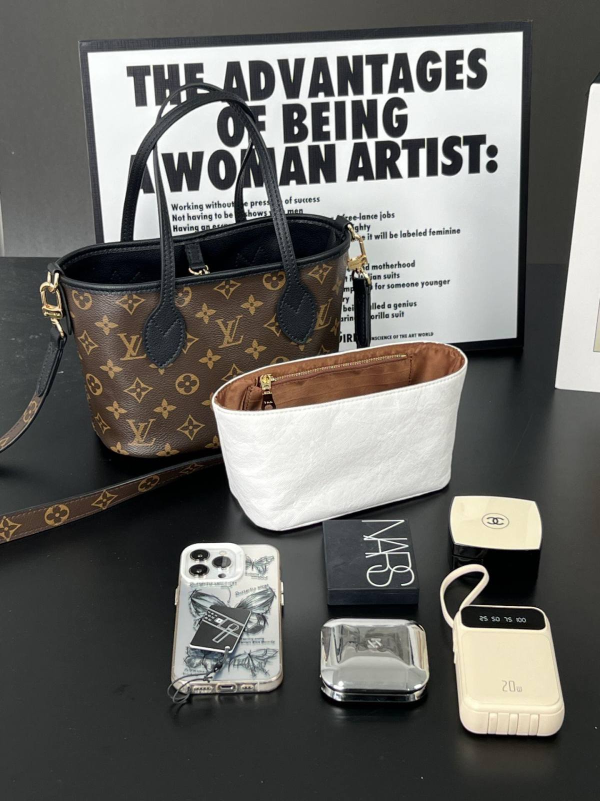 Ellebag’s 1:1 Replica of Louis Vuitton M12099 Neverfull Bandoulière Inside Out BB: Crafting Luxury with Precision-Best Quality Replica designer Bag factory in China