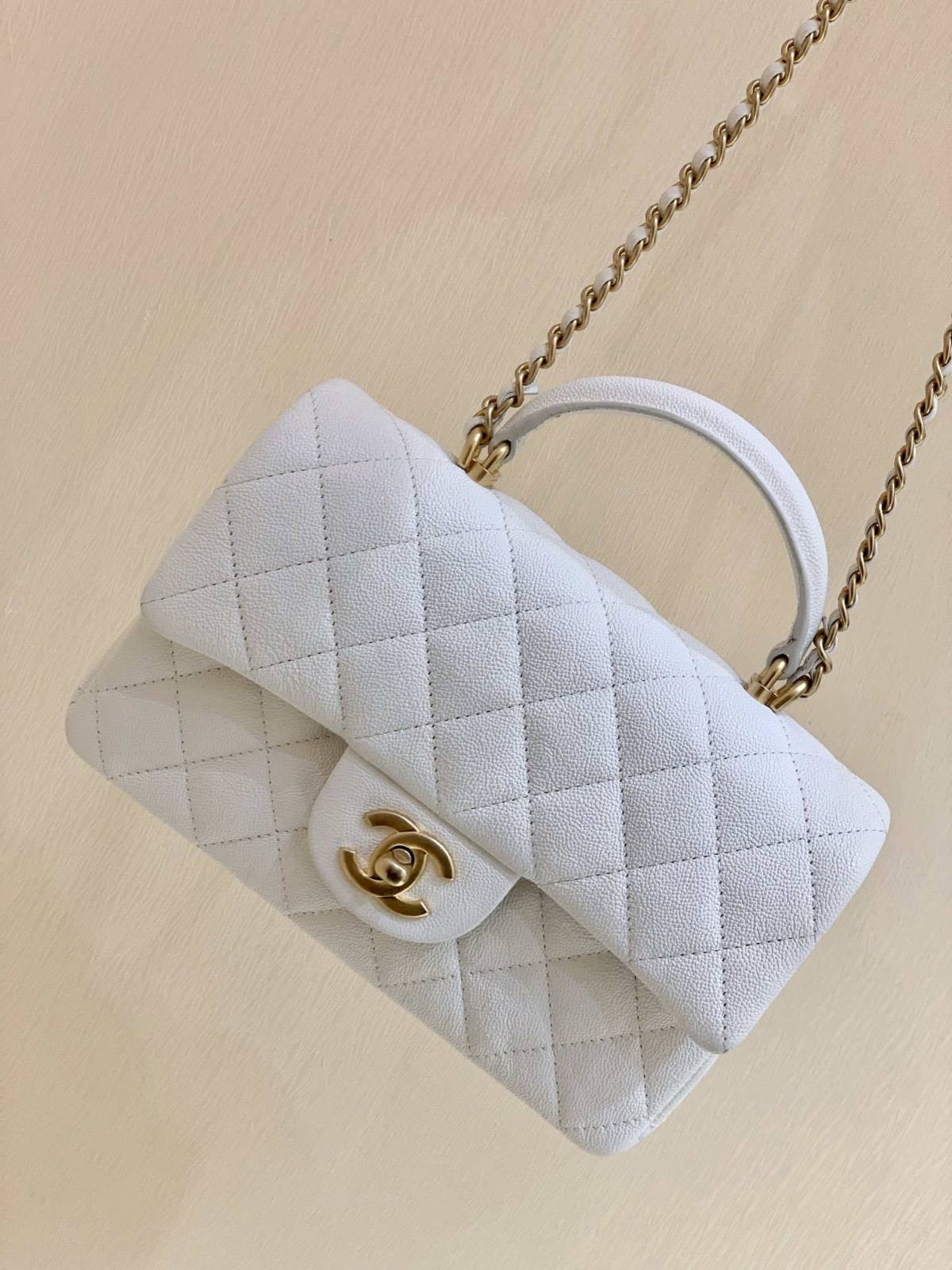 Ellebag’s Masterful Recreation of the Chanel AS2431 White Caviar Leather Mini Flap Bag with Top Handle(2025 Jan Updated)-Best Quality Replica designer Bag factory in China